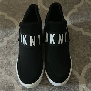 DKNY Black Slip-On Shoes with Bold Branding Gently Used Size 8.5